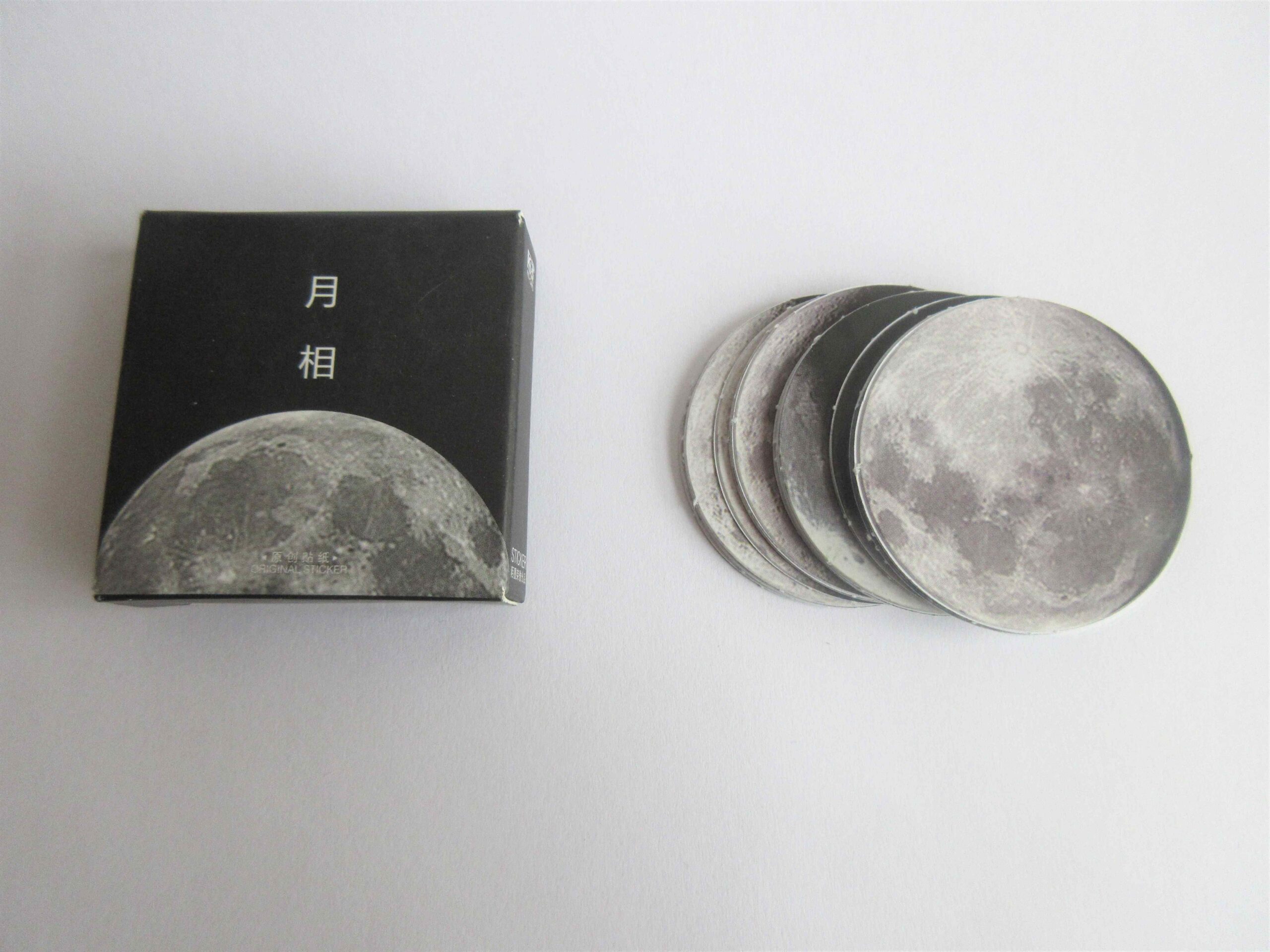 Moon stickers and their packaging