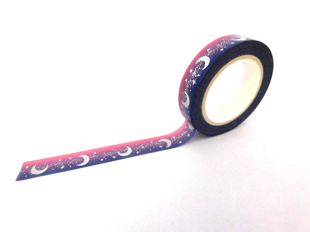 Washi tape with a gradient design containing crescent moons